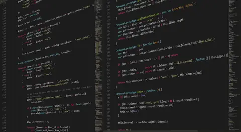 Code in an editor on a dark screen