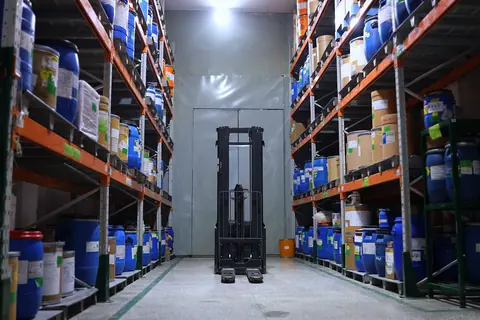 Aisles of a warehouse, stock on racking
